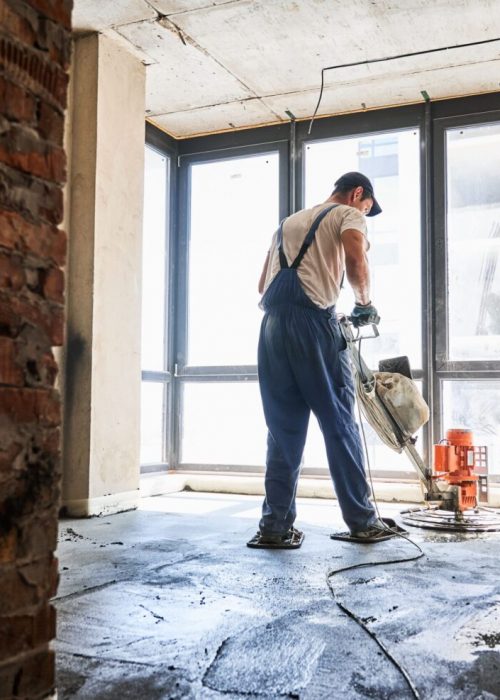 man-using-power-trowel-machine-at-construction-sit-2026-01-07-00-59-09-utc